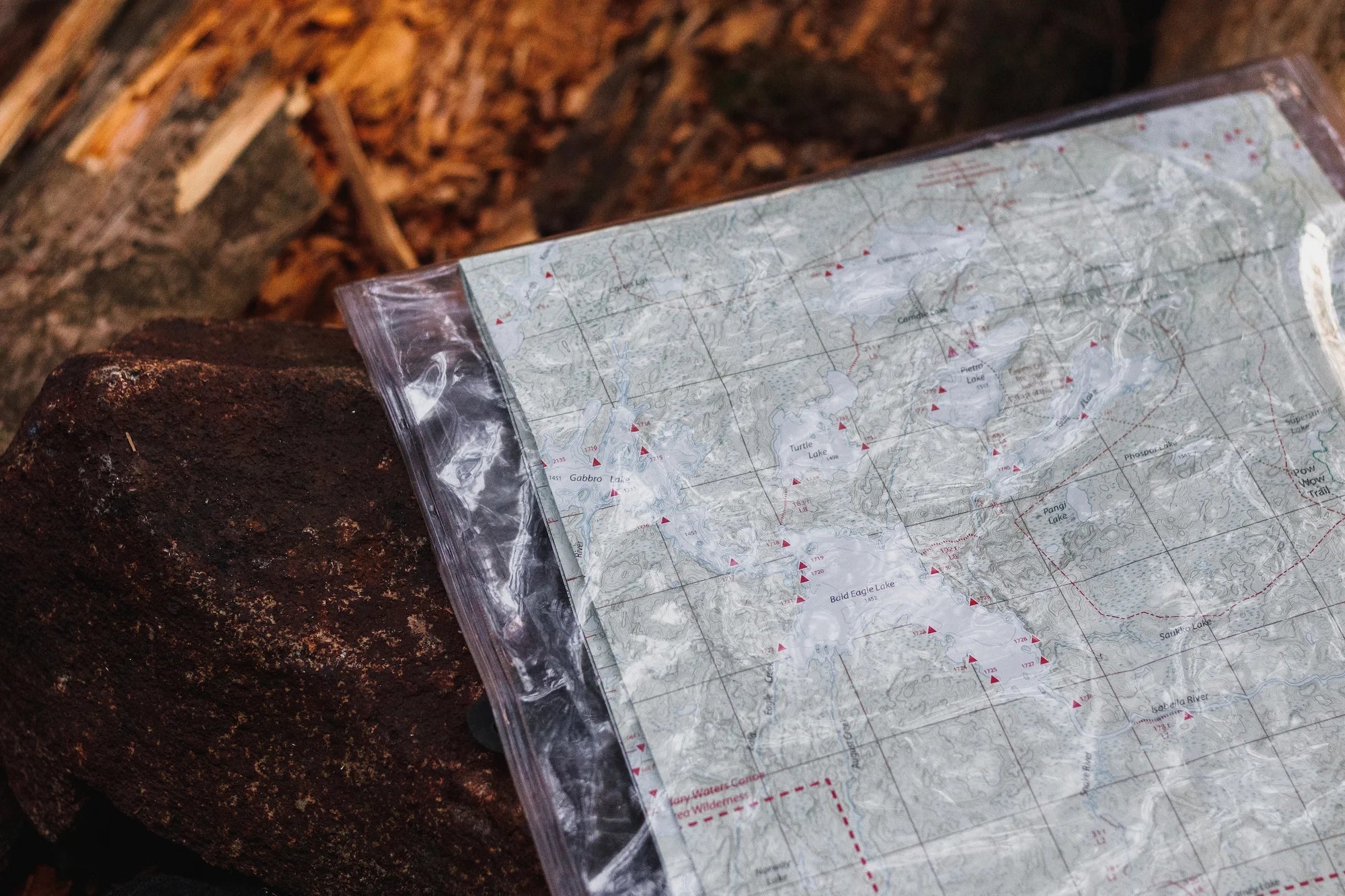Image of a map for the BWCA sitting on the ground