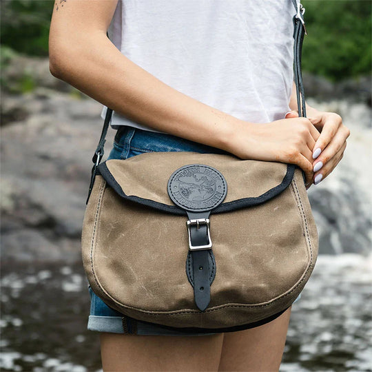 Lake Ontario Medium Shell Purse Black Trim and Wax Khaki on Woman